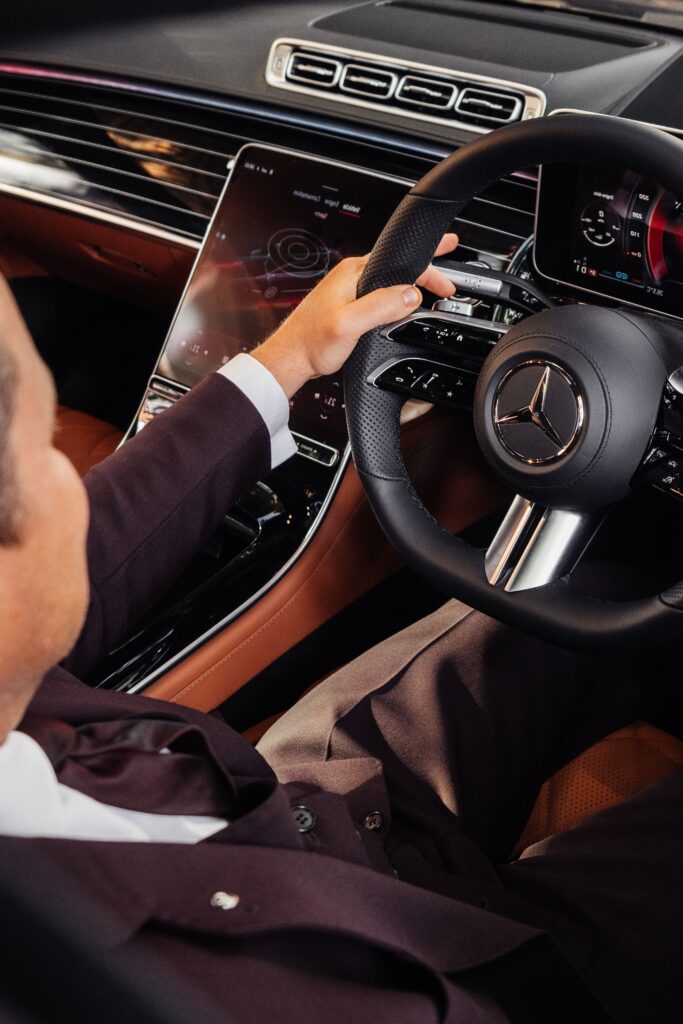 black s class chauffeur driving car